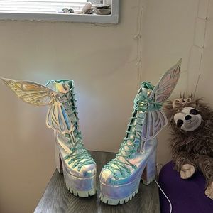 Dolls kill Angel Wong platform heel boots. Worn once. Blemishes on boots